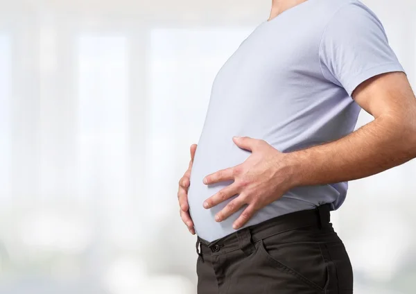 Man with fat stomach. — Stock Photo, Image