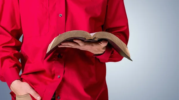 Mão segurando livro em branco — Fotografia de Stock