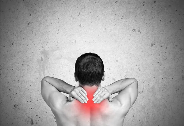 Strong man with neck pain — Stock Photo, Image