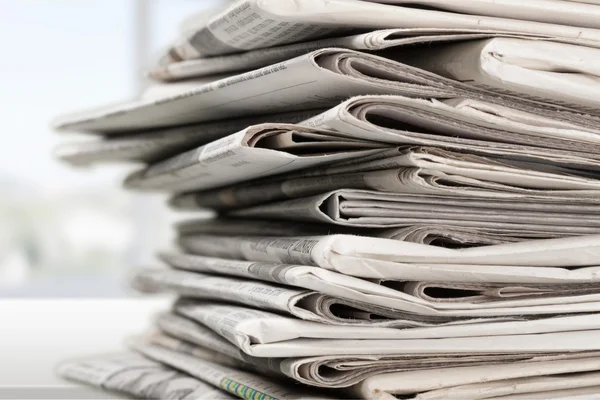 Pile of newspapers on  background — Stock Photo, Image