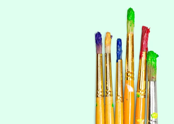 Row of artist paint brushes — Stock Photo, Image