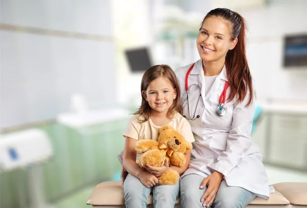 Female doctor and child girl — Stock Photo, Image