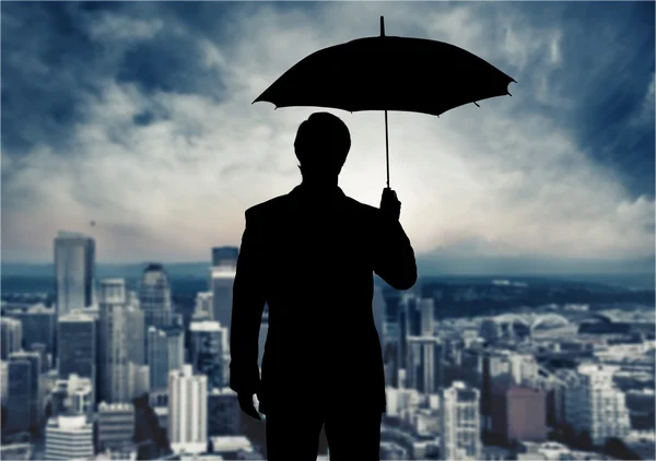 Portrait of  businessman with umbrella — Stock Photo, Image