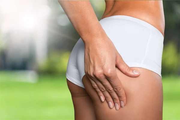 Woman with checking cellulite on her buttocks — Stock Photo, Image