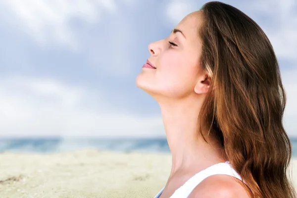 Woman posing near the sea Stock Picture