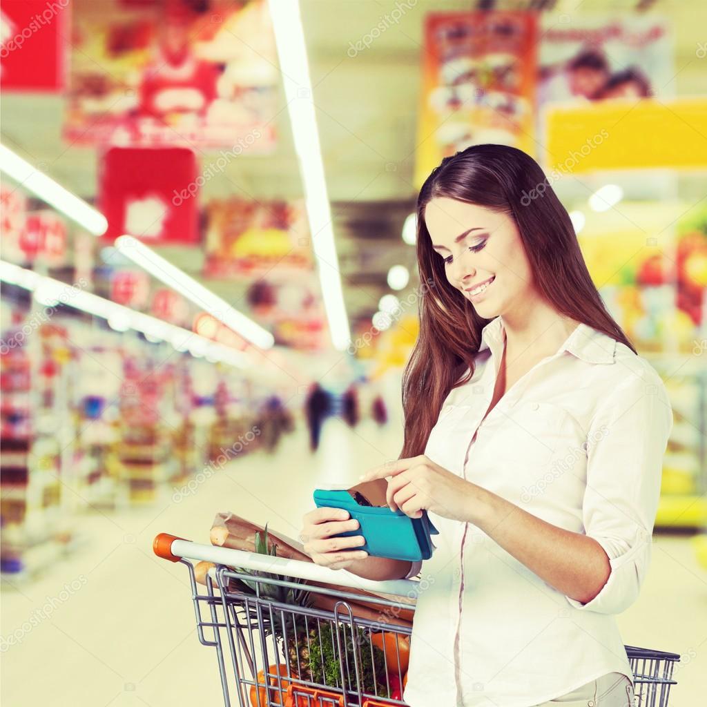 Woman with cart shopping