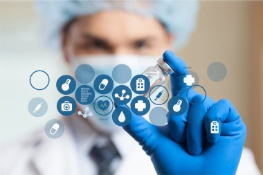 Tıbbi simge ve genç doktor 