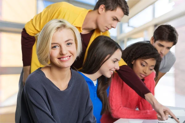 Young students studying subject