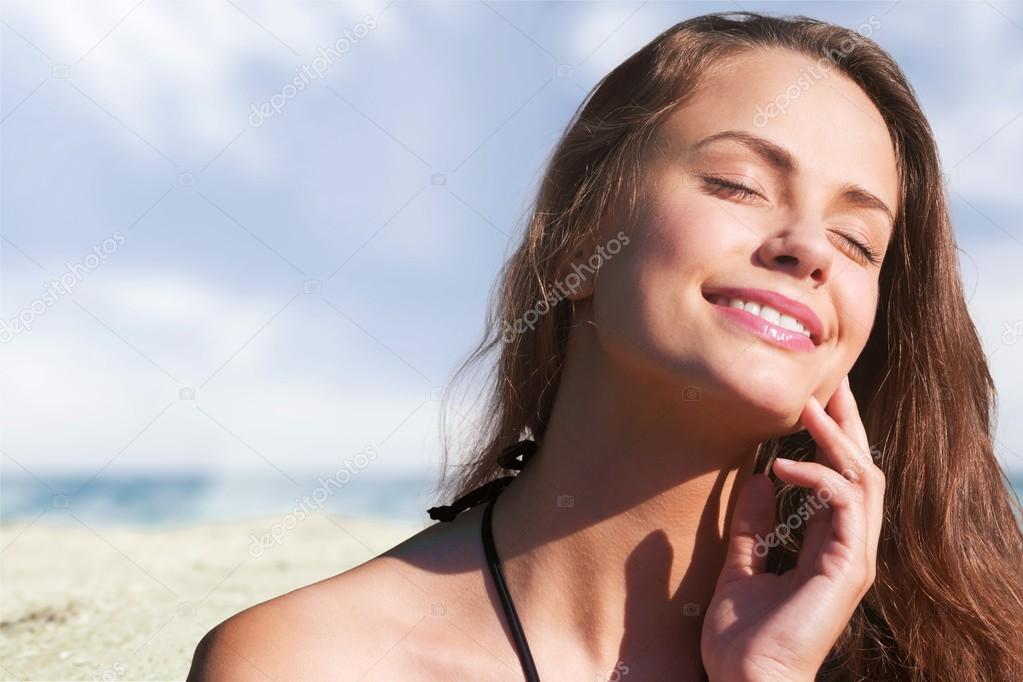 woman posing near the sea 