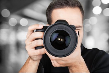 kamera ile erkek fotoğrafçı