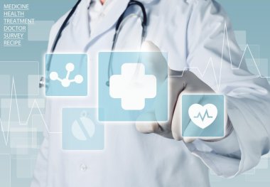 Tıbbi simge ve genç kadın doktor 