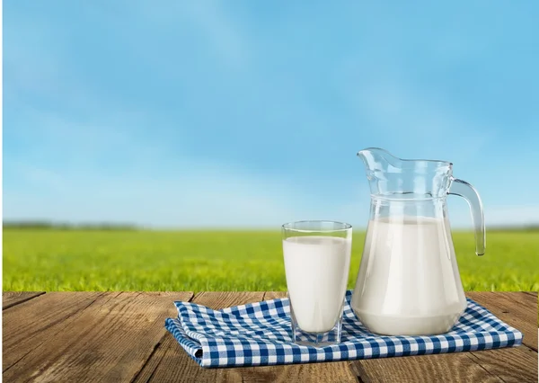 Glass of milk and bottle — Stock Photo, Image