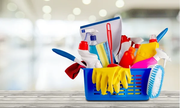 Plastic bottles, cleaning sponge and gloves — Stock Photo, Image