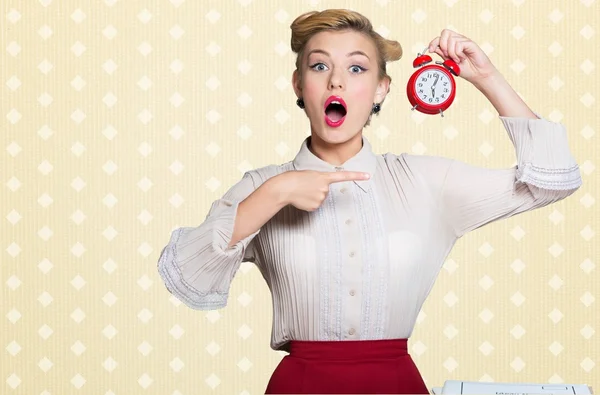 woman with pin-up make-up  and clock