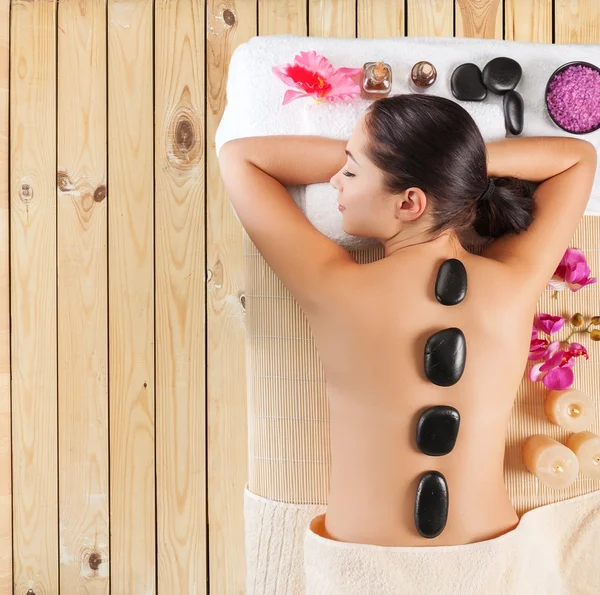 Woman relaxing with massage — Stock Photo, Image