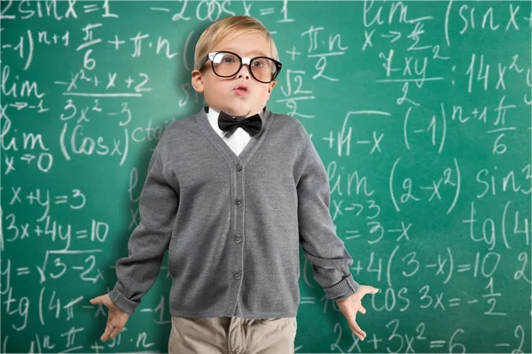 Cute young boy with glasses — Stock Photo, Image