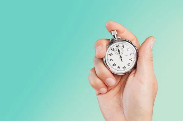 Stopwatch in Human Hand — Stock Photo, Image