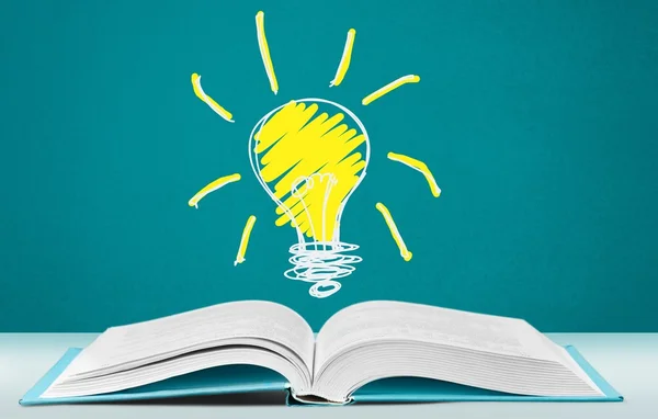 Light bulb and Open Book — Stock Photo, Image