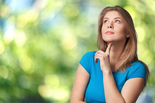 Pretty young thoughtful woman — Stock Photo, Image