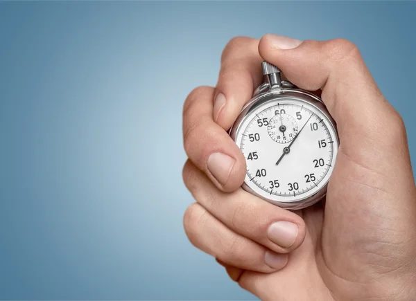 Cronometro in mano umana — Foto Stock