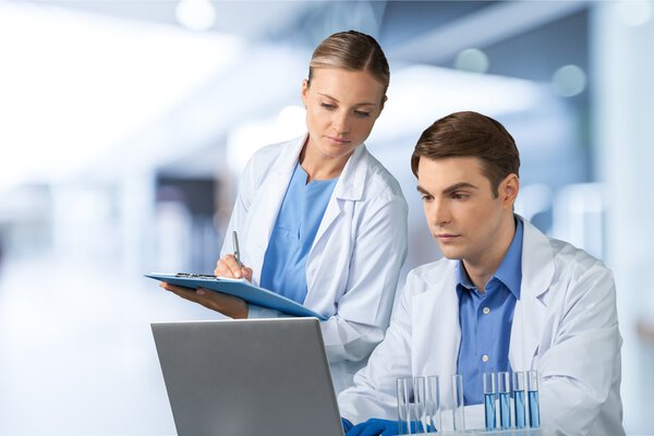 male doctor with female nurse