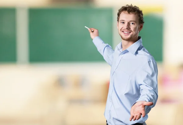 Jonge mannelijke leraar — Stockfoto