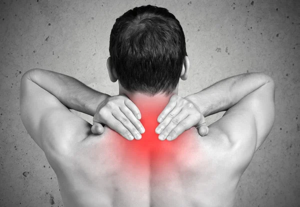 Strong man with neck pain — Stock Photo, Image