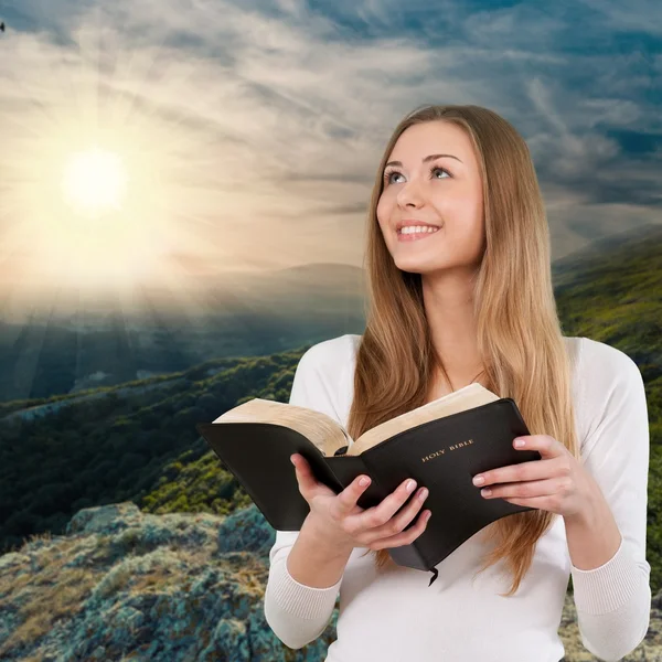 Happy Woman with Bible Royalty Free Stock Photos
