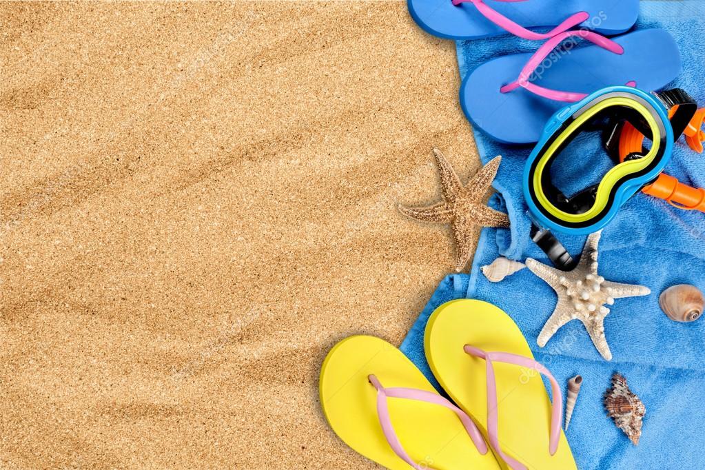 Beach accessories on sand — Stock Photo © billiondigital 118710236