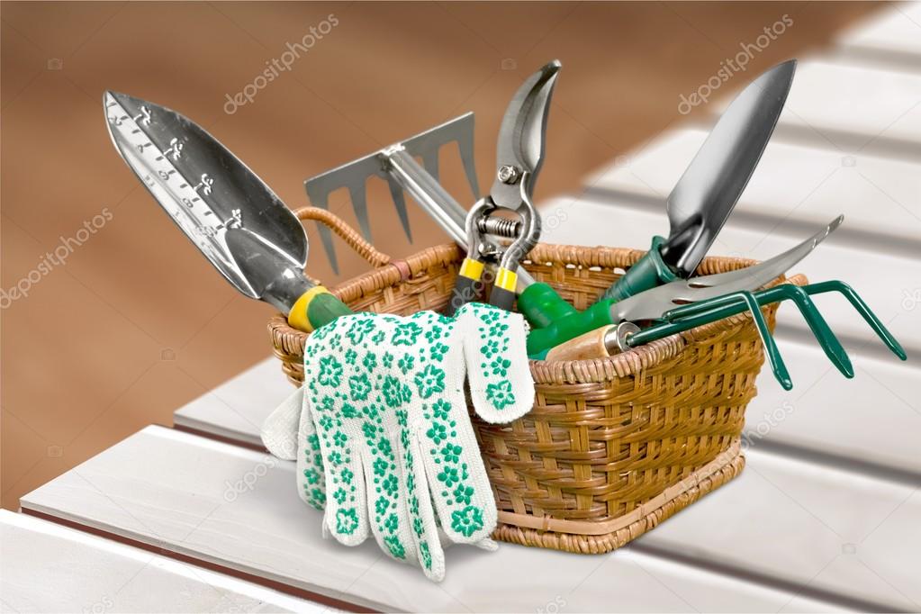 Gardening tools on background