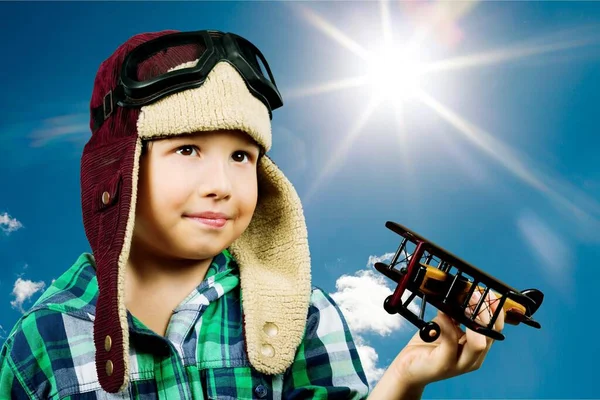 Boy Helmet Pilot Playing Toy Wooden Airplane Clouds Dreaming Becoming — Stock Photo, Image