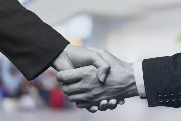 Unternehmer Handschlag Und Geschäftsleute Hintergrund — Stockfoto