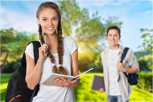 Friendly Girl Rucksack Standing Holding Note Pad Isolated — Stock Photo, Image