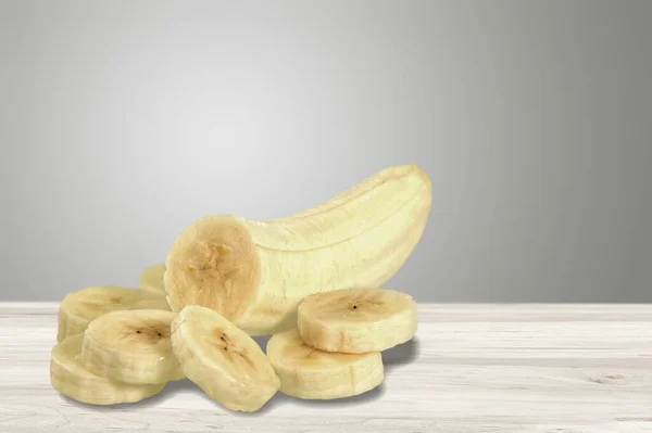 Many Fresh Tasty Banana Slices Desk — Stock Photo, Image