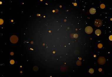 Bokeh 'in parıldayan altın yıldızları karanlık arka planda kutlama yapmak için kullanılıyor.