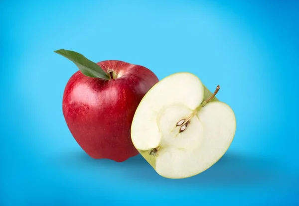 Tasty ripe fresh apple with cut in half slice