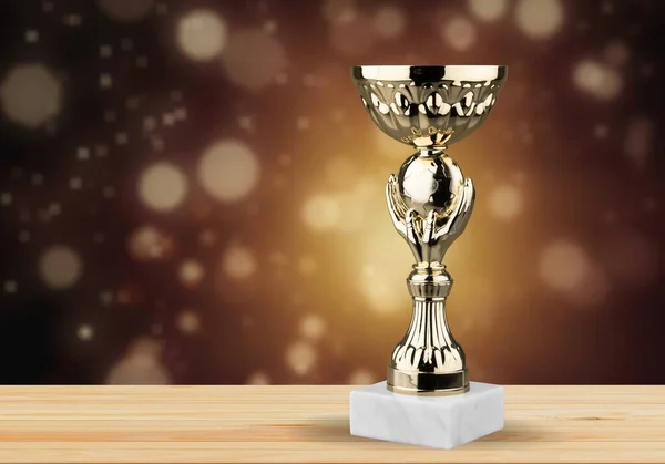 Beautiful Gold Trophy Wooden Table Dark Background Abstract Shiny Lights — Stock Photo, Image