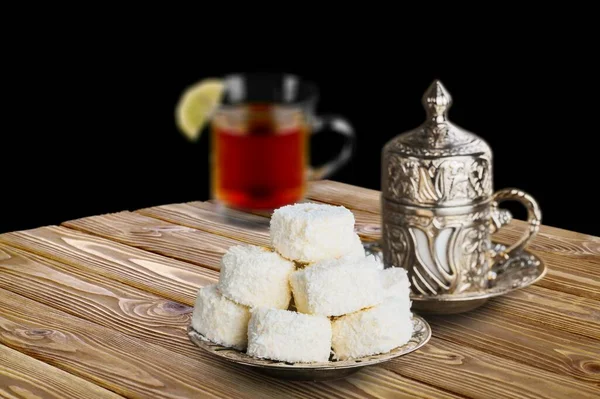 Traditional Turkish Desserts with a cup of coffee.