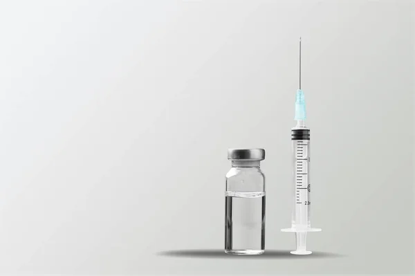 Injektionsflaska Med Coronavirus Vaccin Och Spruta Ljusskrivbordet Bakgrund — Stockfoto