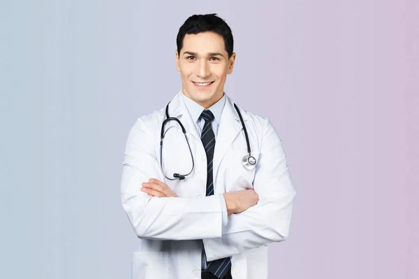 Portrait Positive Male Doctor Posing Crossed Arms Smiling Camera Background — Stock Photo, Image