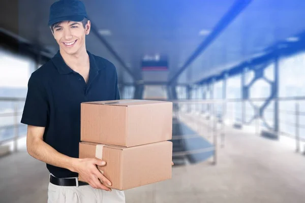 Young Handsome Courier Boxes Blurred Background — ストック写真