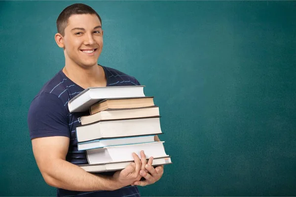 Uomo Studente Con Pila Libri Sulla Balckboard Scuola — Foto Stock