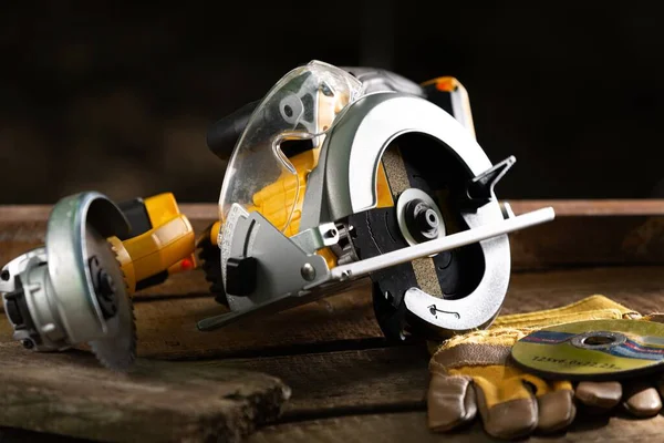 Good style Electrical wheel saw on working table in carpentry workshop