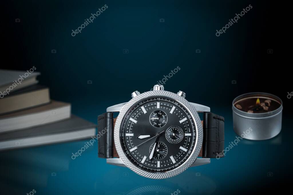 Luxury vintage wristwatch model black on the desk