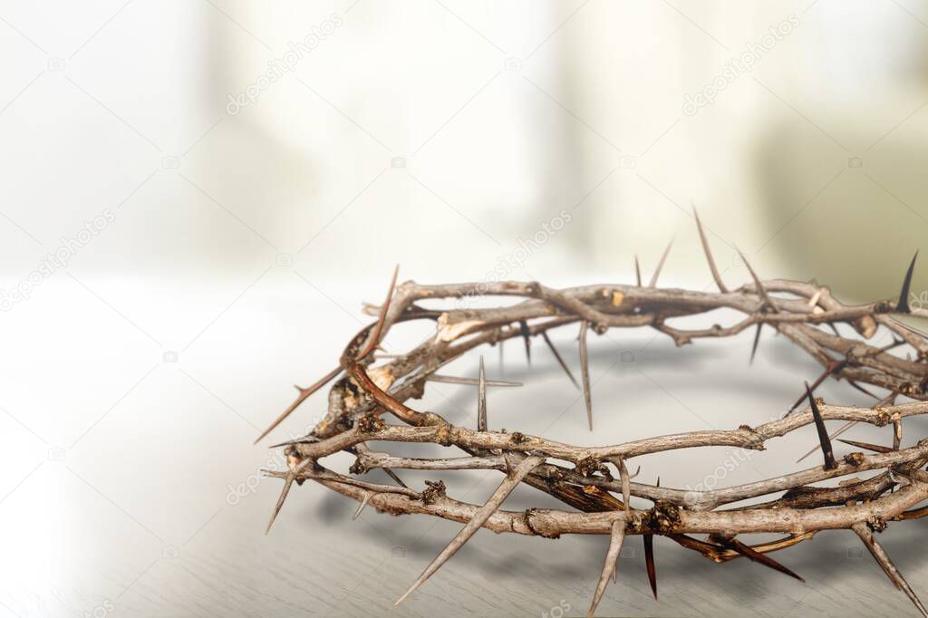 Wooden holy crown of thorns on the desk