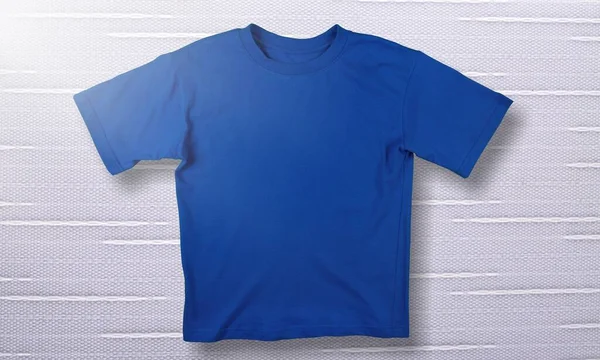 标识或设计桌子上的蓝色T恤空白 — 图库照片