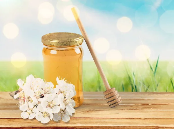 Sweet Honey Jar Surrounded Spring Flowers Blossoms — Stock Photo, Image