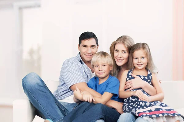 Young Family Home Smiling Camera — Stock Photo, Image