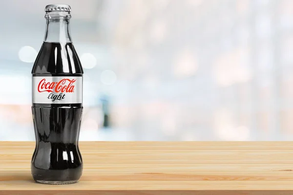 Coca Cola Lichtflasche Auf Hintergrund Nahaufnahme — Stockfoto
