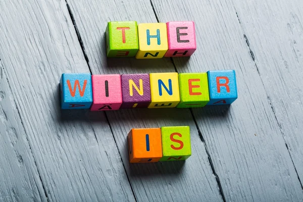Winner. The Winner Is... card isolated on white — Stock Photo, Image